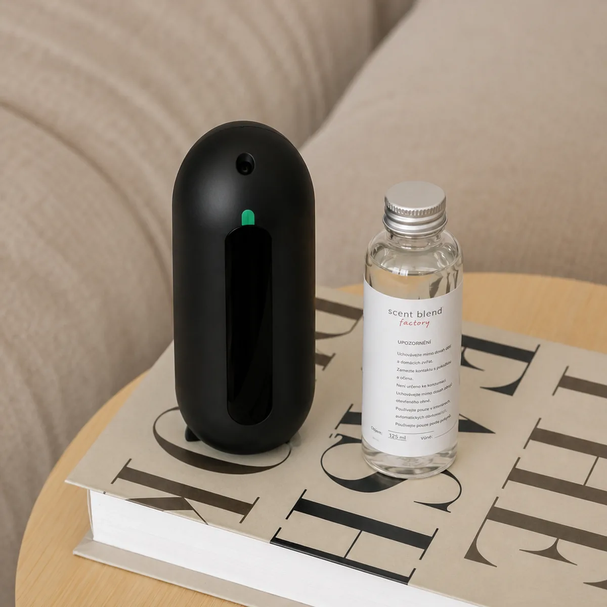 Scent Go Home plug-in diffuser beside a 125 ml fragrance refill bottle